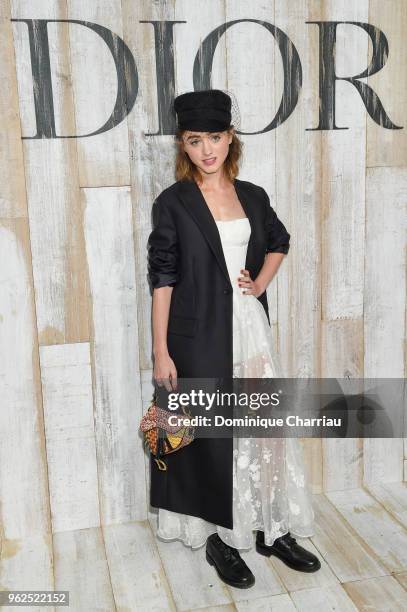 Natalia Dyer poses at a photocall during Christian Dior Couture S/S19 Cruise Collection on May 25, 2018 in Chantilly, France.