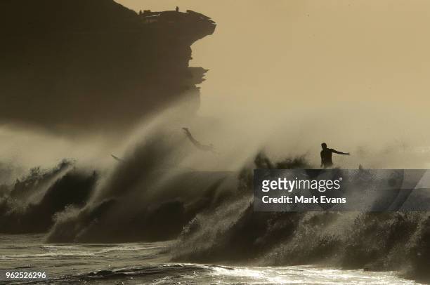Surfers take advantage of a large swell at Bronte Beach on May 26, 2018 in Sydney, Australia.