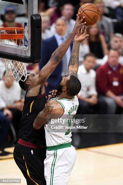 Tristan Thompson of the Cleveland Cavaliers blocks a shot by Marcus Morris of the Boston Celtics in the first half during Game Six of the 2018 NBA...