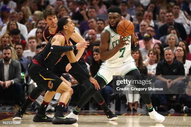 Jaylen Brown of the Boston Celtics handles the ball against Jordan Clarkson of the Cleveland Cavaliers in the second quarter during Game Six of the...