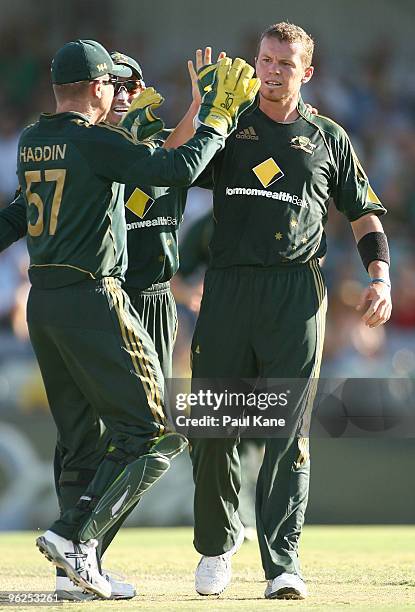 Peter Siddle of Australia celebrates dismissing Mohammad Yousuf of Pakistan during the fourth One Day International match between Australia and...