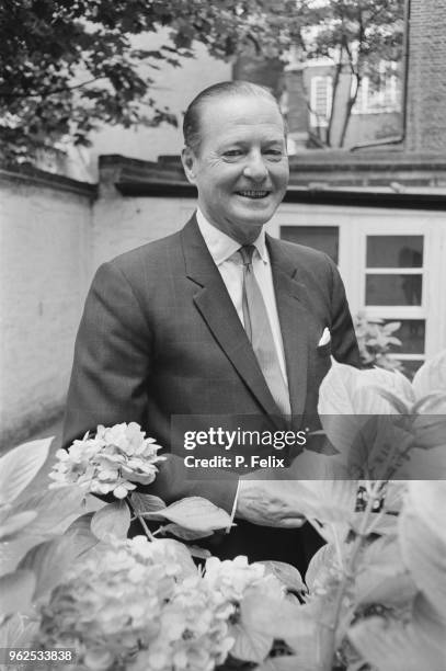 English dramatist and playwright Terence Rattigan pictured at a press call to promote the first run of his new play 'A Bequest to the Nation' at the...