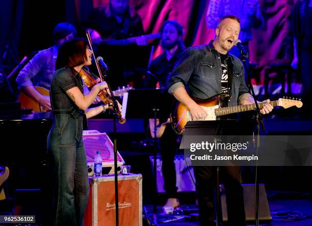 Amanda Shires and Jason Isbell perform onstage for Country's Roaring '70s: Outlaws and Armadillos exhibition opening concert at Country Music Hall of...