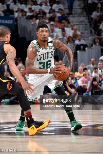 Marcus Smart of the Boston Celtics looks to pass the ball against the Cleveland Cavaliersin Game Six of the Eastern Conference Finals of the 2018 NBA...