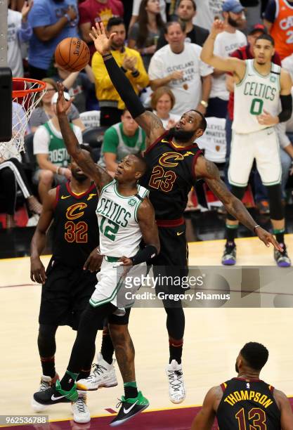 LeBron James of the Cleveland Cavaliers goes up for the block against Terry Rozier of the Boston Celtics in the third quarter during Game Six of the...