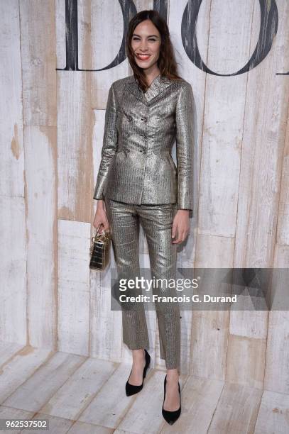 Alexa Chung attends the Christian Dior Couture S/S19 Cruise Collection Photocall At Grandes Ecuries De Chantillyon May 25, 2018 in Chantilly, France.