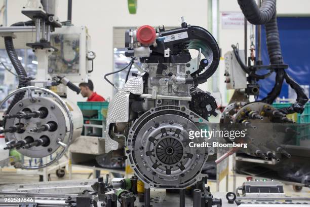 Engine components stand at the Mahindra & Mahindra Ltd. Facility in Chakan, Maharashtra, India, on Tuesday, April 3, 2018. Mahindra & Mahindra is...