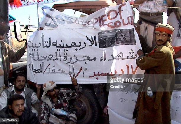 Yemeni supporters of al-Qaeda gather in the Abyan province village of Maajala, 480 kms southeast of Sanaa, on January 28, 2010 to mark 40 days since...