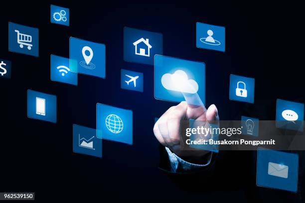 businessman pressing button on virtual screens  interface and technology - future of media stock-fotos und bilder