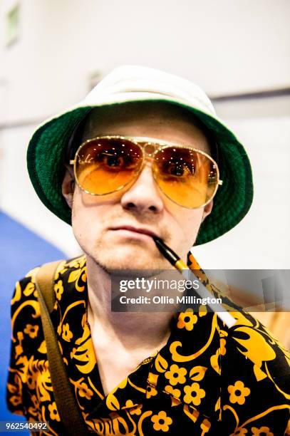 Cosplayer in character as Hunter S. Thompson in Fear And Loathing in Las Vegas seen on Day 1 of the MCM London Comic Con at The ExCel on May 25, 2018...