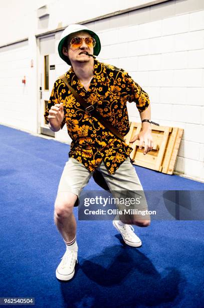 Cosplayer in character as Hunter S. Thompson in Fear And Loathing in Las Vegas seen on Day 1 of the MCM London Comic Con at The ExCel on May 25, 2018...