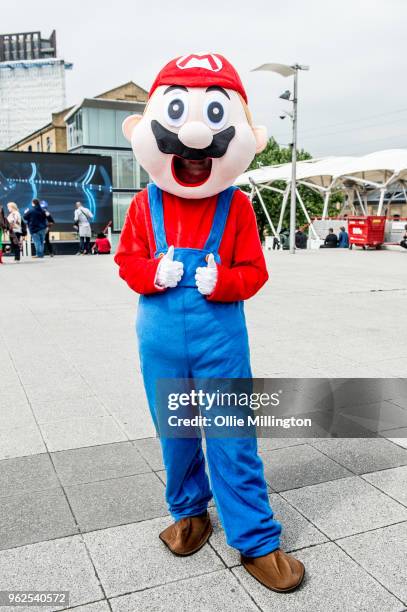 Cosplayer in character as Nintendos Super Mario from Super Mario Bros on Day 1 of the MCM London Comic Con at The ExCel on May 25, 2018 in London,...