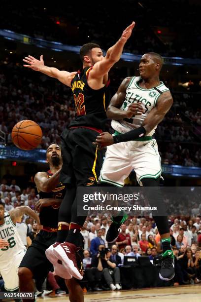 Terry Rozier of the Boston Celtics passes around Larry Nance Jr. Of the Cleveland Cavaliers in the fourth quarter during Game Six of the 2018 NBA...