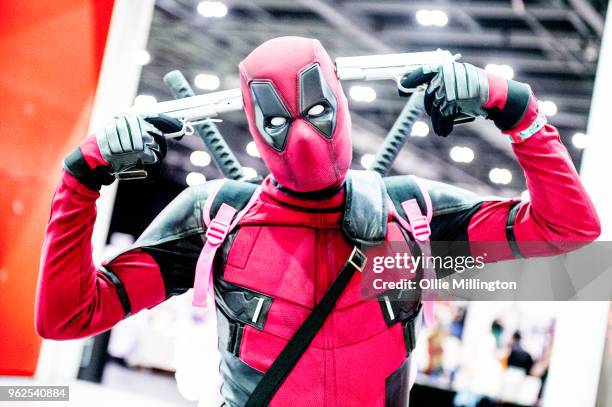 Cosplayer in character as Deadpool seen on Day 1 of the MCM London Comic Con at The ExCel on May 25, 2018 in London, England.