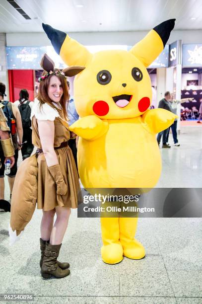 Cosplayers in character as Pikachu from Pokemon on Day 1 of the MCM London Comic Con at The ExCel on May 25, 2018 in London, England.