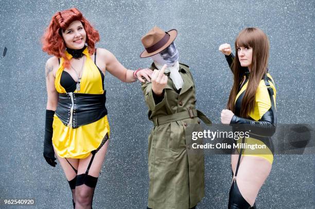 Cosplayers in character as Silk Spectre II and Rorschach from Watchmen on Day 1 of the MCM London Comic Con at The ExCel on May 25, 2018 in London,...
