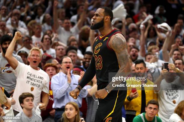 LeBron James of the Cleveland Cavaliers reacts after a basket in the fourth quarter against the Boston Celtics during Game Six of the 2018 NBA...