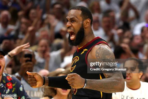 LeBron James of the Cleveland Cavaliers reacts after a basket in the fourth quarter against the Boston Celtics during Game Six of the 2018 NBA...