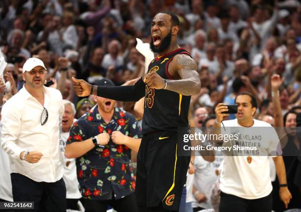 LeBron James of the Cleveland Cavaliers reacts after a basket in the fourth quarter against the Boston Celtics during Game Six of the 2018 NBA...