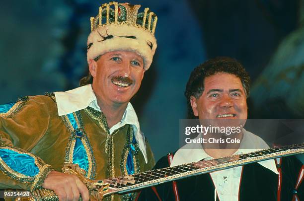 English cricketer Ian Botham stars in the pantomime 'Jack and the Beanstalk' in Bournemouth, with Welsh comedian Max Boyce , December 1991.