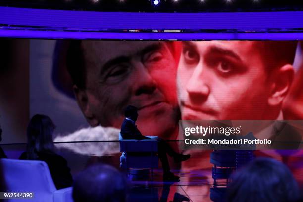 Italian politician Matteo Salvini, Federal Secretary of Lega Nord party, attends the tv show "Porta a Porta". On the background screen the photos of...