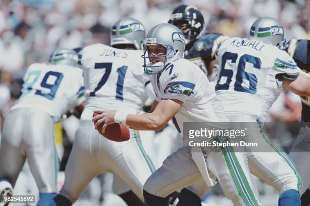 Jon Kitna, Quarterback for the Seattle Seahawks prepares to throw a pass during the American Football Conference West game against the San Diego...