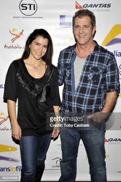 Paloma Felisberto and Mel Gibson pose for a picture at the Australians In Film screening of "Edge Of Darkness" held at the Landmark Theatre on...
