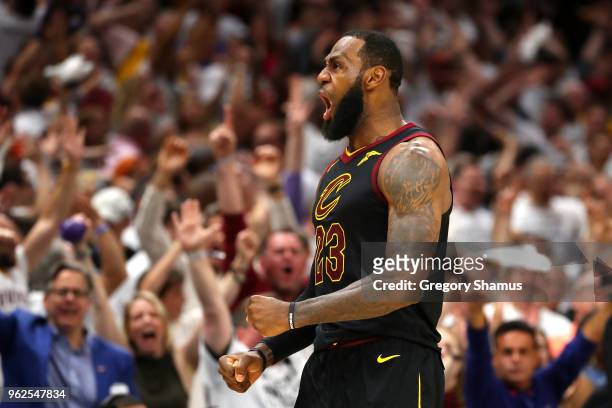 LeBron James of the Cleveland Cavaliers reacts after a basket in the fourth quarter against the Boston Celtics during Game Six of the 2018 NBA...