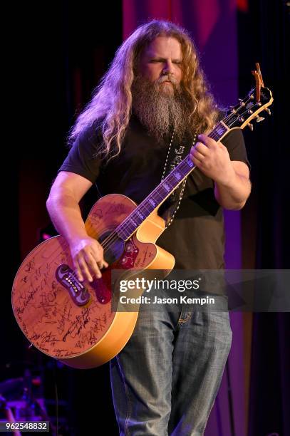 Jamey Johnson performs onstage for Country's Roaring '70s: Outlaws and Armadillos exhibition opening concert at Country Music Hall of Fame and Museum...