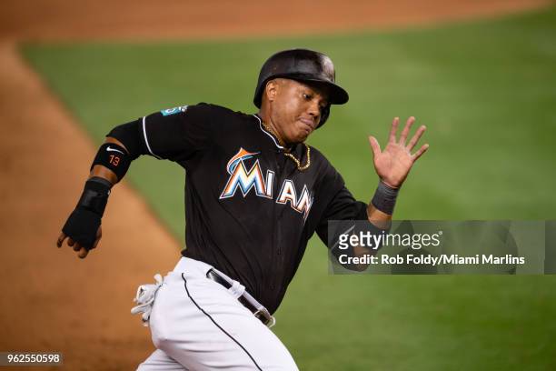 Starlin Castro of the Miami Marlins scores a run during the seventh inning of the game against the Washington Nationals at Marlins Park on May 25,...