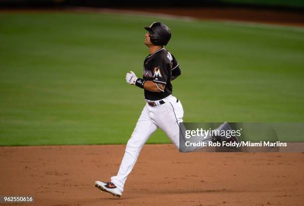 Martin Prado of the Miami Marlins hits a double during the third inning of the game against the Washington Nationals at Marlins Park on May 25, 2018...