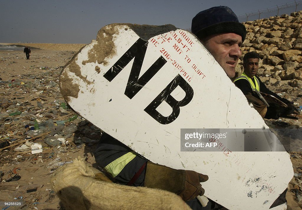 Lebanese civil defence workers carry par