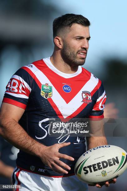 James Tedesco of the Roosters warms up during the round 12 NRL match between the Sydney Roosters and the Gold Coast Titans at Central Coast Stadium...