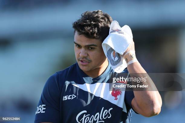 Latrell Mitchell of the Roosters warms up during the round 12 NRL match between the Sydney Roosters and the Gold Coast Titans at Central Coast...