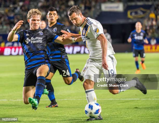 Chris Pontius of Los Angeles Galaxy and Florian Jungwirth of San Jose Earthquakes during the Los Angeles Galaxy's MLS match against San Jose...