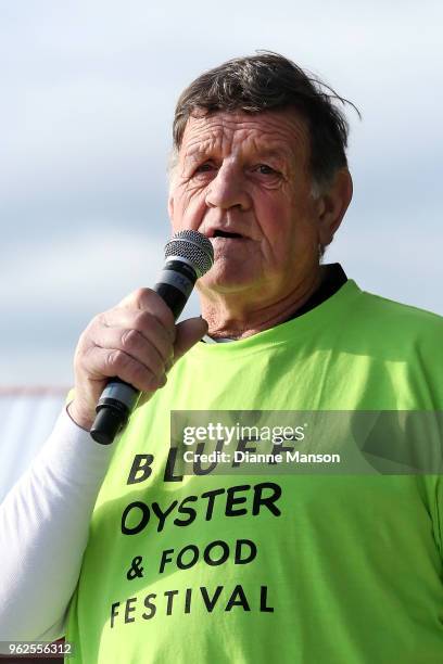 John Edminstin, Bluff Festival chairman, speaks during the opening ceremony at the Bluff Oyster & Food Festival on May 26, 2018 in Bluff, New...