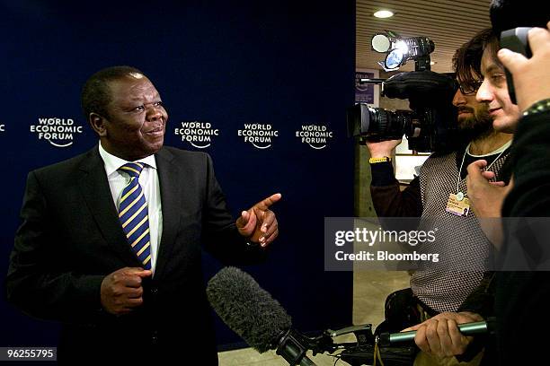 Morgan Tsvangirai, prime minister of Zimbabwe, speaks to reporters following a panel discussion titled "Meeting the Millennium Development Goals" on...