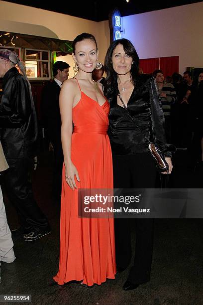 Olivia Wilde and Lisa Edelstein attend the Artists For Haiti Art Auction at Bergamot Station on January 28, 2010 in Santa Monica, California.