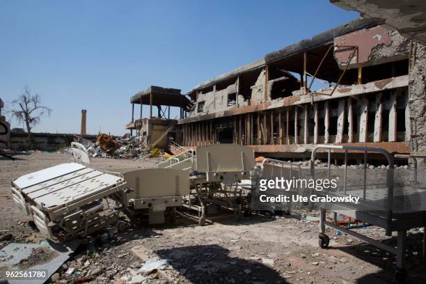 April 24: Hospital beds in front of the destroyed Al Shifaa Hospital in Mosul on April 24, 2018 in MOSUL, IRAQ.