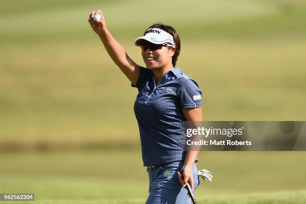 Eri Okayama of Japan reacts after her putt on the 18th hole during the second round of the Resorttust Ladies at Kansai Golf Club on May 26, 2018 in...