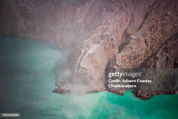 kawah ijen volcano crater , east java, indonesia - sulfuric acid stock pictures, royalty-free photos & images