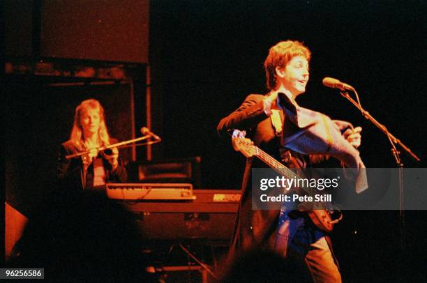 Paul McCartney and Linda McCartney of Wings perform on stage at The Lewisham Odeon on December 3rd, 1979 in London, United Kingdom.