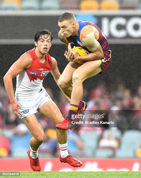 Mitch Robinson of the Lions takes a mark during the round 10 AFL match between the Brisbane Lions and the Sydney Swans at The Gabba on May 26, 2018...