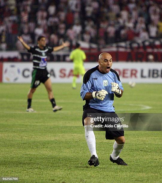 Jorge Contreras the goalkeeper of Uruguay's Racing Club celebrates a goal against Colombia's Atletico Junior during their match as part of the...