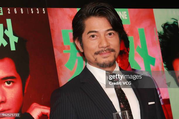 Actor Aaron Kwok attends City Magazine exhibition on May 25, 2018 in Hong Kong, Hong Kong.