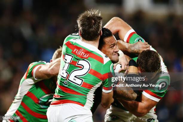 James Gavet of the Warriors is tackled by Angus Crichton of the Rabbitohs during the round 12 NRL match between the New Zealand Warriors and the...