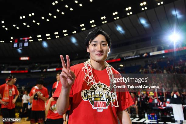 Daiki Tanaka of the Alvark Tokyo cuts down the net after defeating the Chiba Jets 85-60 the B.League Championship Final between Alvark Tokyo and...