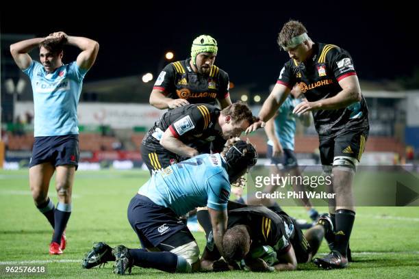 The Chiefs celebrate a try to Nathan Harris during the round 15 Super Rugby match between the Chiefs and the Waratahs at FMG Stadium on May 26, 2018...