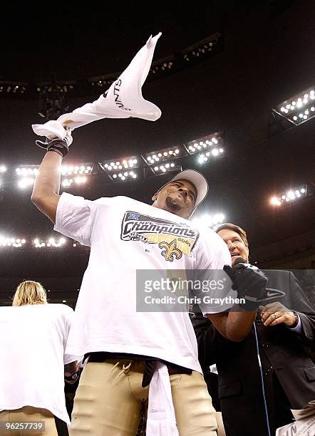 Darren Sharper of the New Orleans Saints celebrates after the Saints won 31-28 in overtime against the Minnesota Vikings during the NFC Championship...