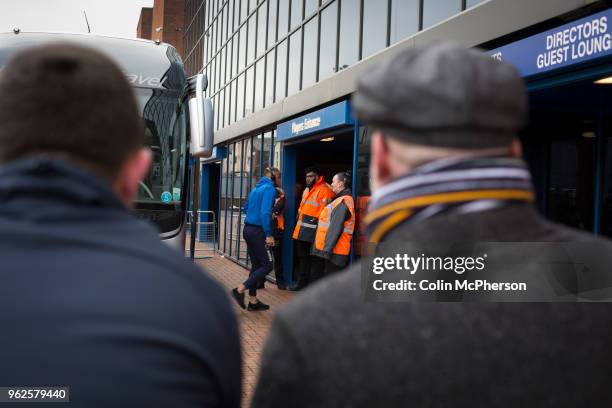 Visiting supporters watching their players disembarking from the team bus before Blackburn Rovers played Shrewsbury Town in a Sky Bet League One...